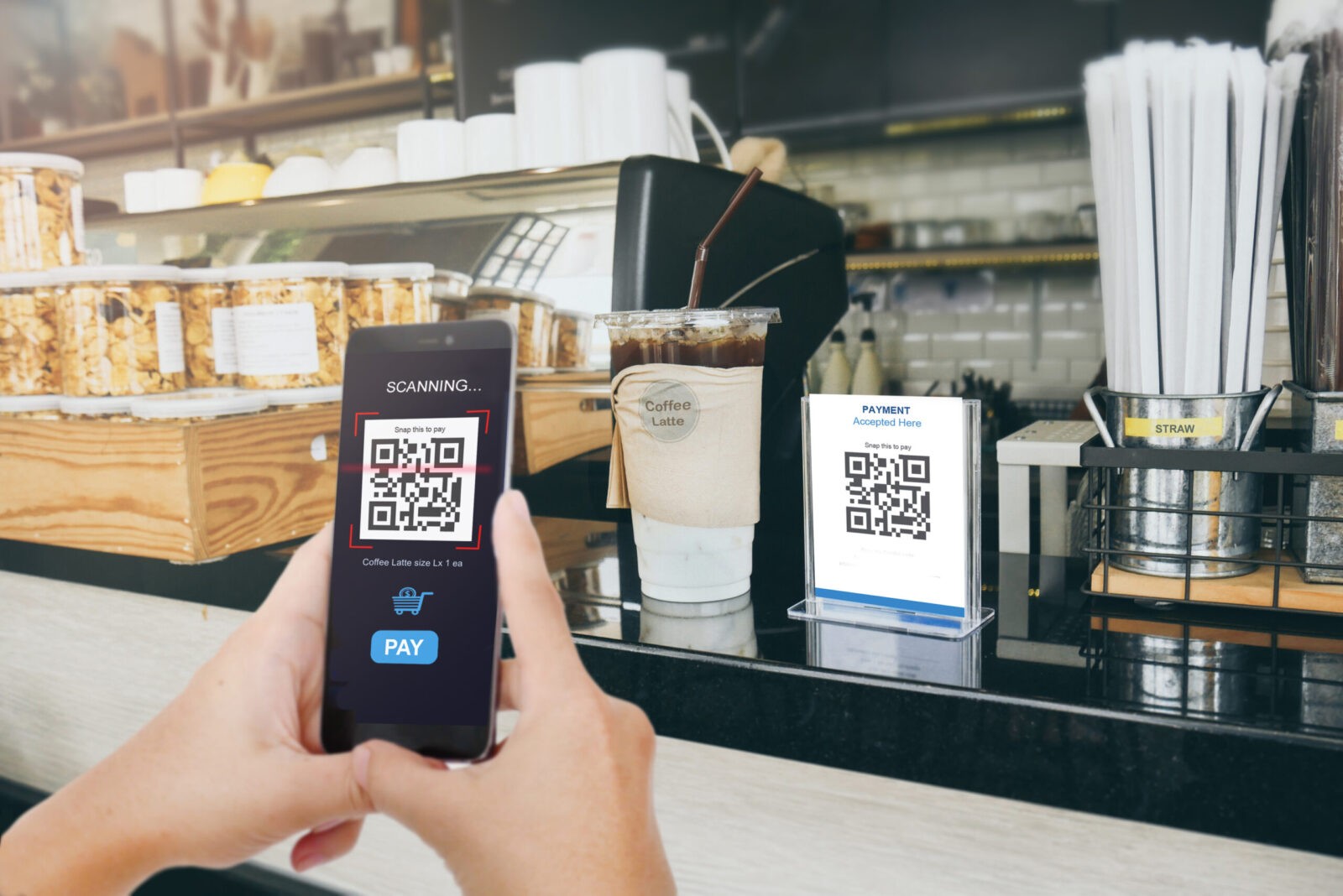 Qr code payment, E wallet , cashless technology concept. Man scaning  tag in Coffee shop accepted generate digital pay without money.